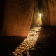 Winter solstice sunlight shining into the sacred chamber of Newgrange passage tomb.